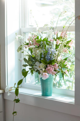 The Gated Garden - Flowers in a window