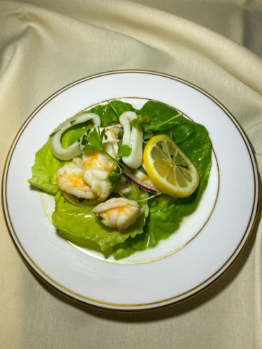 Seafood Salad, shrimp, calamari, scallop, celery, red onion, parsley lemon olive oil